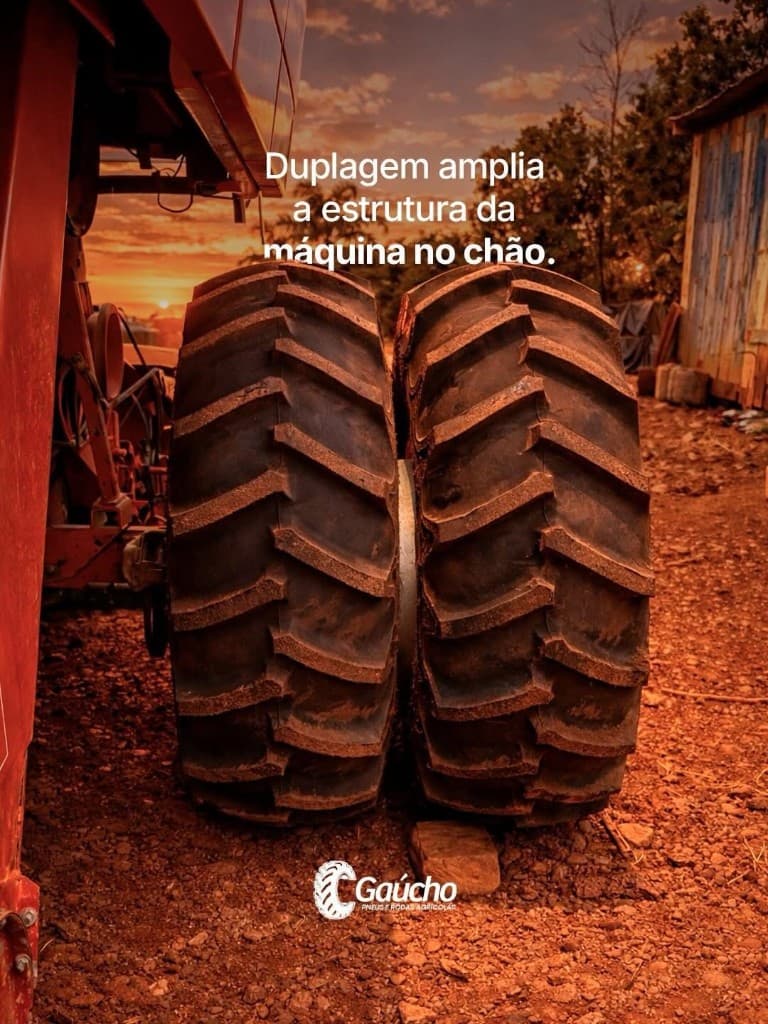 Close de pneus em duplagem ao entardecer; texto sobre estabilidade e estrutura da máquina no solo.