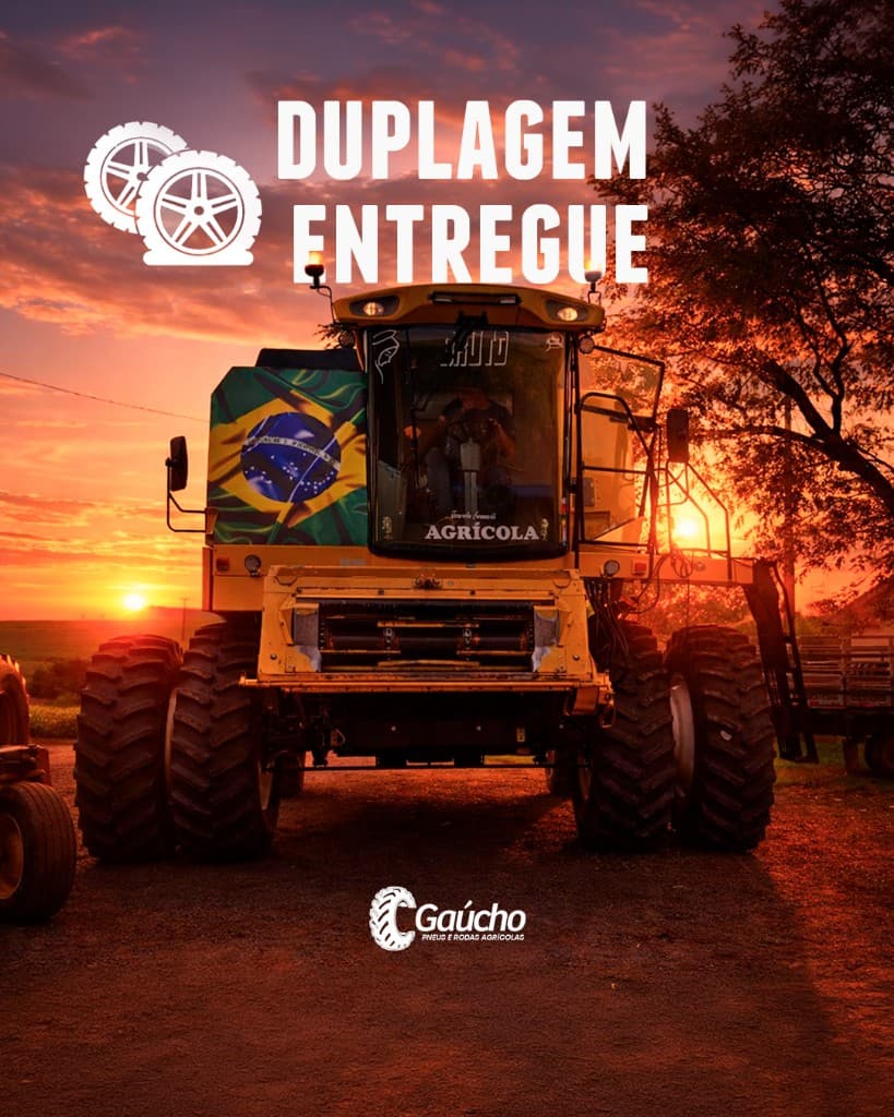 Duplagem em máquina New Holland ao pôr do sol; referência de montagem e região Entre Rios do Sul — Gaúcho Pneus.