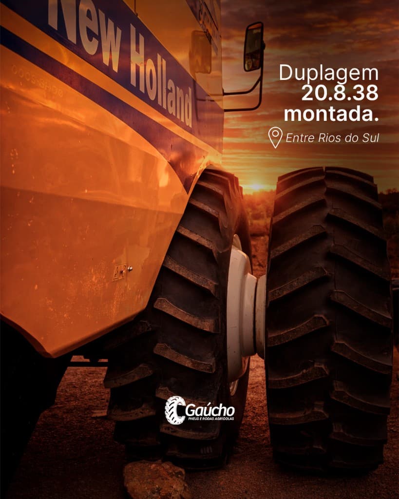 Colheitadeira com rodado duplo; arte DUPLAGEM ENTREGUE com bandeira brasileira ao entardecer — Gaúcho Pneus.